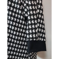 Modna tunika damska o linii trapezu - klasyczny wzór PEPITKA